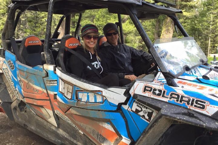 a man riding on the back of a truck