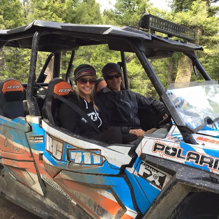 a man riding on the back of a truck